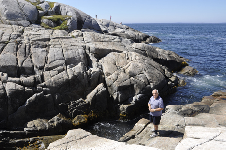 Lee Duquette checks out the waves in the Atlantic Ocean