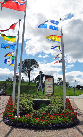 Flags and a sign about the Reversing Falls 