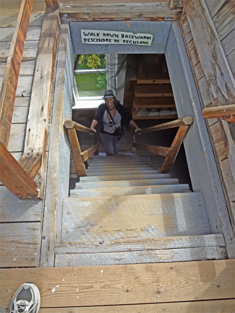 Karen Duquette climbing UP the staircase.