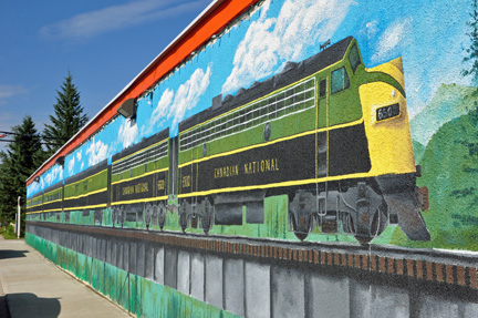 train painting on a building in the city