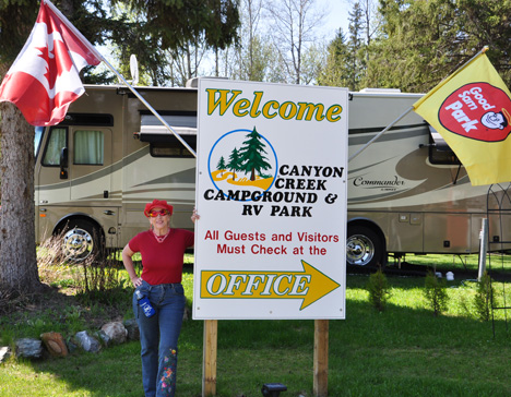 Karen Duquette at the Welcom to Canyon Creek sign