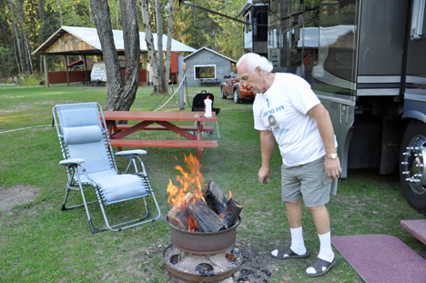 Lee checking the campfire