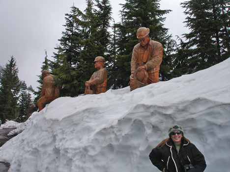 Karen Duquette and some of the carvings