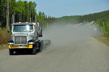 semi-truck throwing gravel at the two RV Gypsies