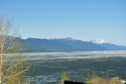 partially frozen lake by the Alaskan highway