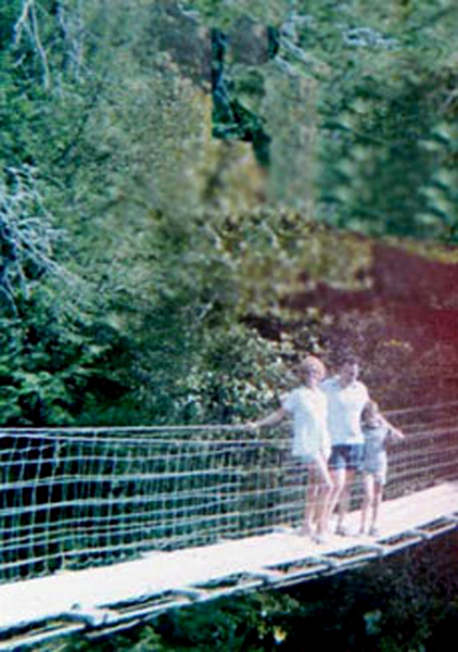 Karen, Lee and Brian Duquette on the swiniging bridge