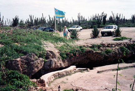 Lee Duuqette at the top of the cave opening