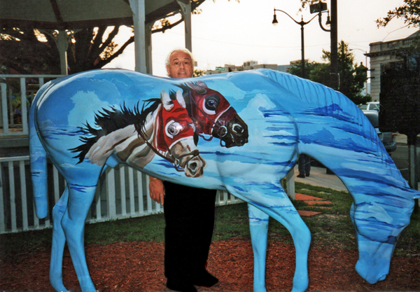 Lee Duquette by a painted horse