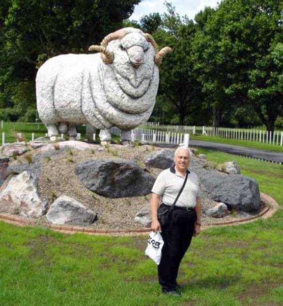 Lee Duquette near a giant sheep statue