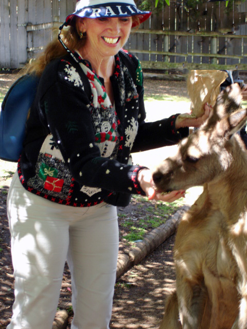 Karen Duquette feeding a kangaroo