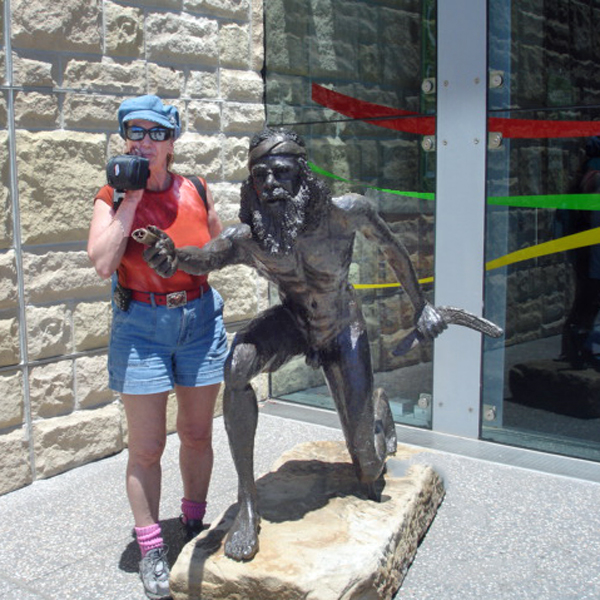 Karen Duquette and a statue