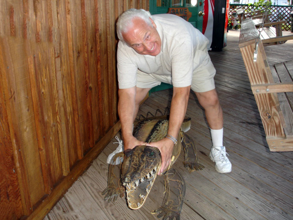 Lee Duquette wrestling the alligator