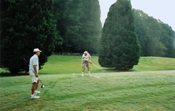 Lee Duquette hitting the golf ball