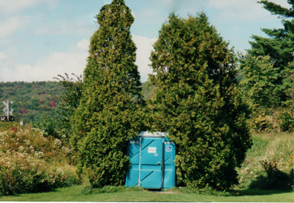 an outhouse in the middle of nowwhere