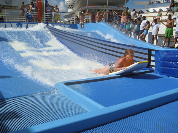 Karen Duquette surfing