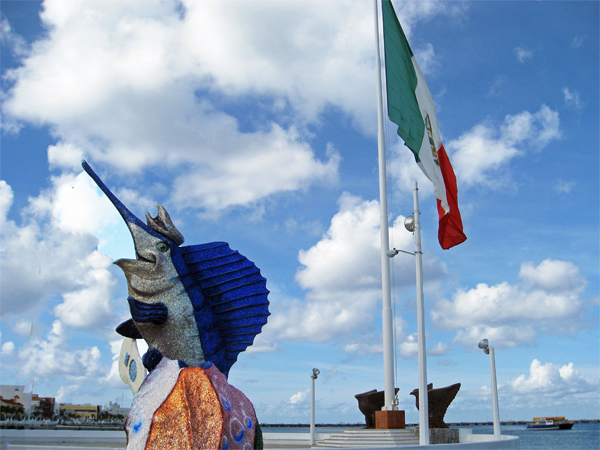 beautiful dolphin statue by the sea