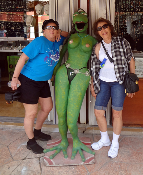 Karen and Ophie and a green frog