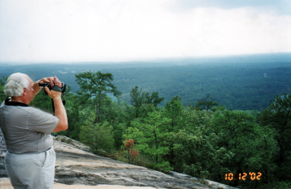 Lee Duquette enjoying the view from the top of Stone Mountain in 2002.