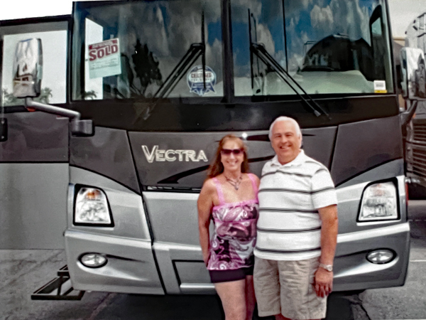 Karen and Lee Duquette by their new RV