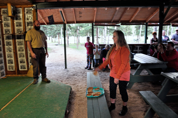 Karen duquette trhowing a pancake