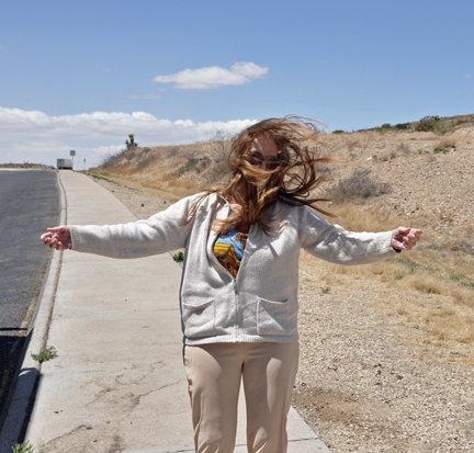 Karen trying to walk in the strong winds