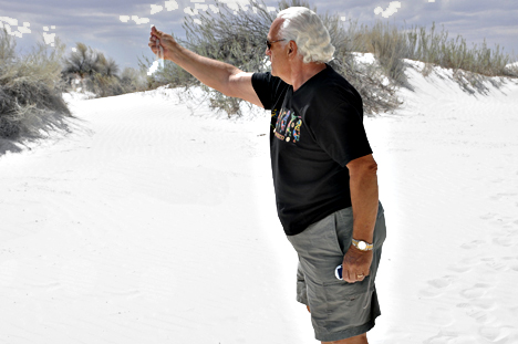 Lee Duquette plays with the white sand