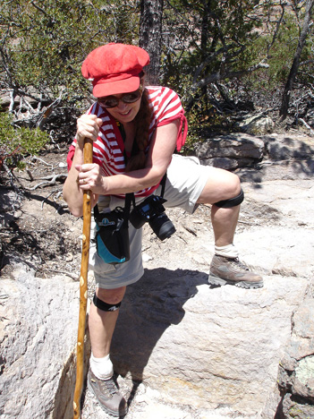 Karen has to step up over a big rock