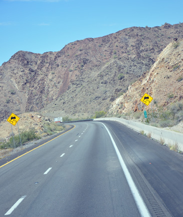 semi-curvy road through the mountains