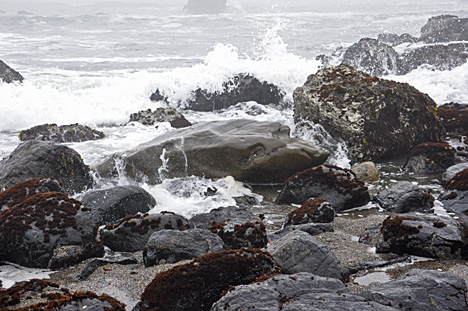 waves crashing over the rocks