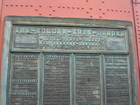 metal sign on the bridge