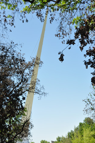 a peek at part of the Sundial Bridge pylon from the hiking trail behind Sulphur Creek Bridge