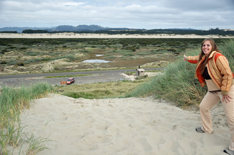 Karen looking back down the path at the car of the two RV Gypsies