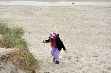 Karen struggles to get back to the top of the sand dune