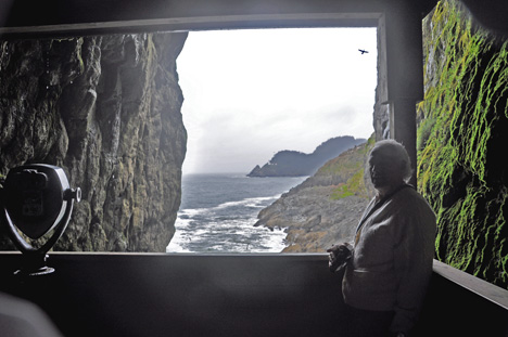 Lee looking outside into the ocean