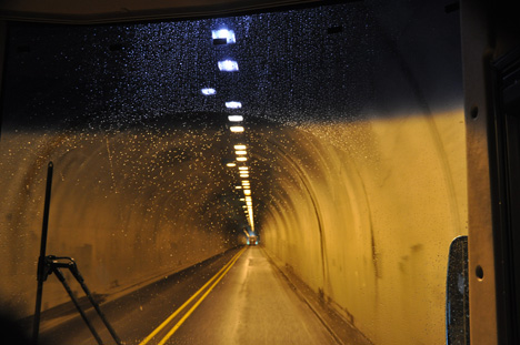 inside the tunnel as taken through a rain speckled window