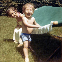 Brian and his sister play outside