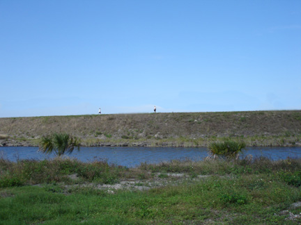 Lee and Alex hike the berm