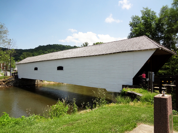 Karen Duquette entering the covered bridge