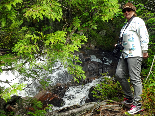 Karen Duquette relaxes at Rainbow Falls