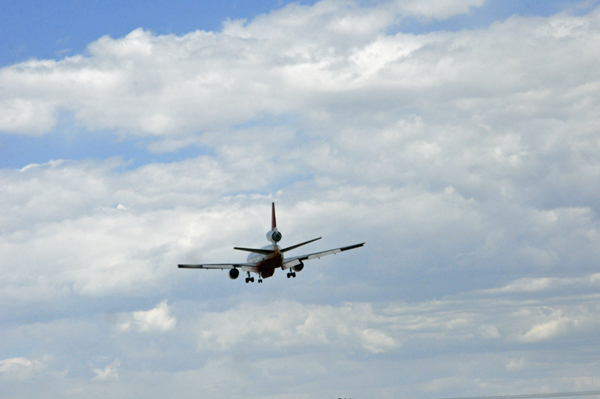 jet flying in front of the two RV Gypsies RV
