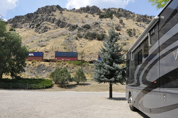 a train passing the front of the two RV Gypies RV
