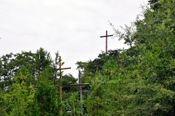 crosses high on the hill