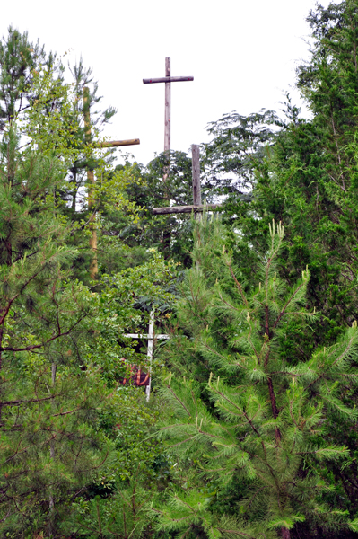 crosses high on the hill