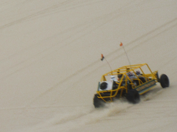 the yellow, bigger dune buggy