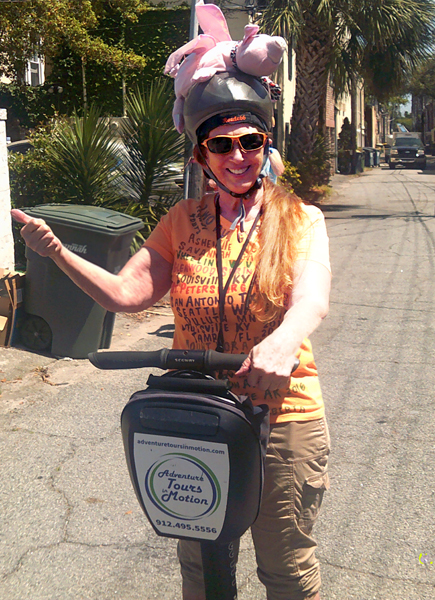 Karen Duquette in a pink pig helmet