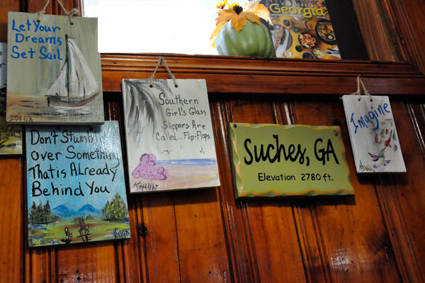 signs on wall at Hole In The Wall