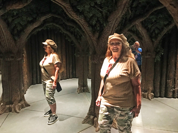 Lee Duquette photographs Karen Duquette in the mirror maze