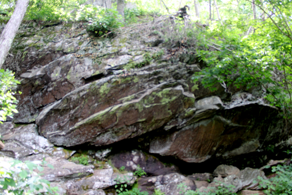 a big boulder on the trail