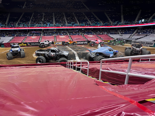 All 8 of the Monster Trucks paraded around the mound