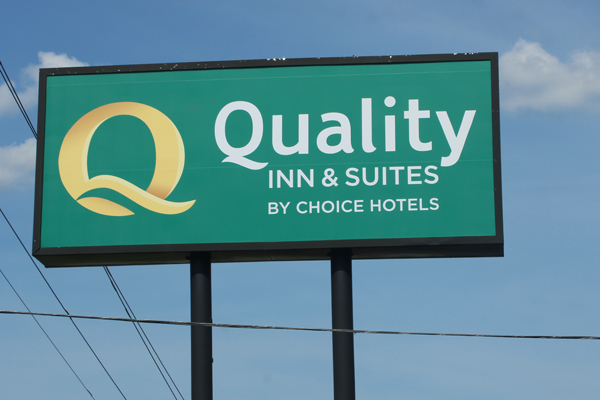 Quality Inn Hotel sign